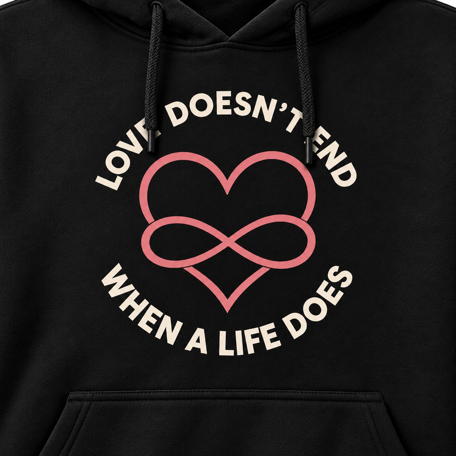 Closeup of Love Doesn't End When a Life Does lettering and heart infinity print with drawstrings in front