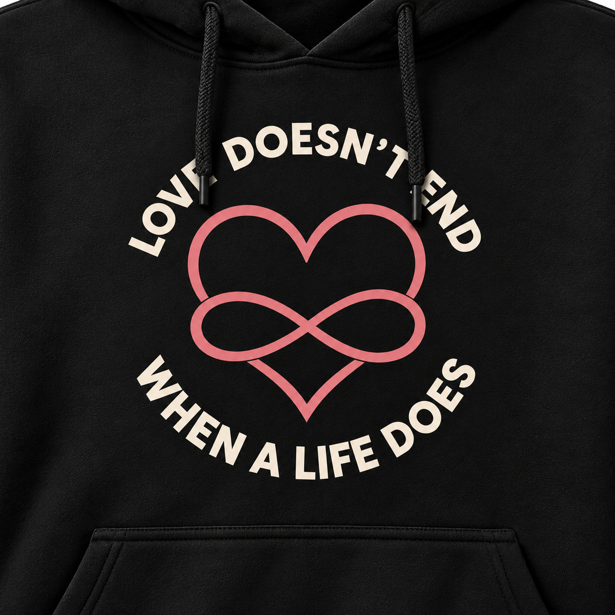 Closeup of Love Doesn't End When a Life Does lettering and heart infinity print with drawstrings in front